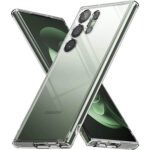 Εξαιρετικά λεπτή θήκη σιλικόνης για Samsung Galaxy S23 Ultra - Clear 1 Η ομάδα του Topcase.gr γνωρίζει πόσο πολύτιμο είναι για εσάς το κινητό σας τηλέφωνο. Γι’ αυτόν τον λόγο έχουμε θέσει ως στόχο μας να προσφέρουμε τη μέγιστη δυνατή ολοκληρωμένη προστασία για το τηλέφωνό σας. Γνωρίζουμε επίσης ότι όσο περισσότερο χρόνο παραμένετε χωρίς προστασία, τόσο αυξάνεται ο κίνδυνος για θραύση ή ζημιά. Για αυτόν ακριβώς τον λόγο προσπαθούμε να πραγματοποιούμε κάθε παράδοση στον συντομότερο δυνατό χρόνο. / Topcase, Topcase.gr, Τοπκέις, Τοπκέις 2007, Τοπ κέις, Τοπκέις.gr, Τοπκέιςγρ / www.topcase.gr